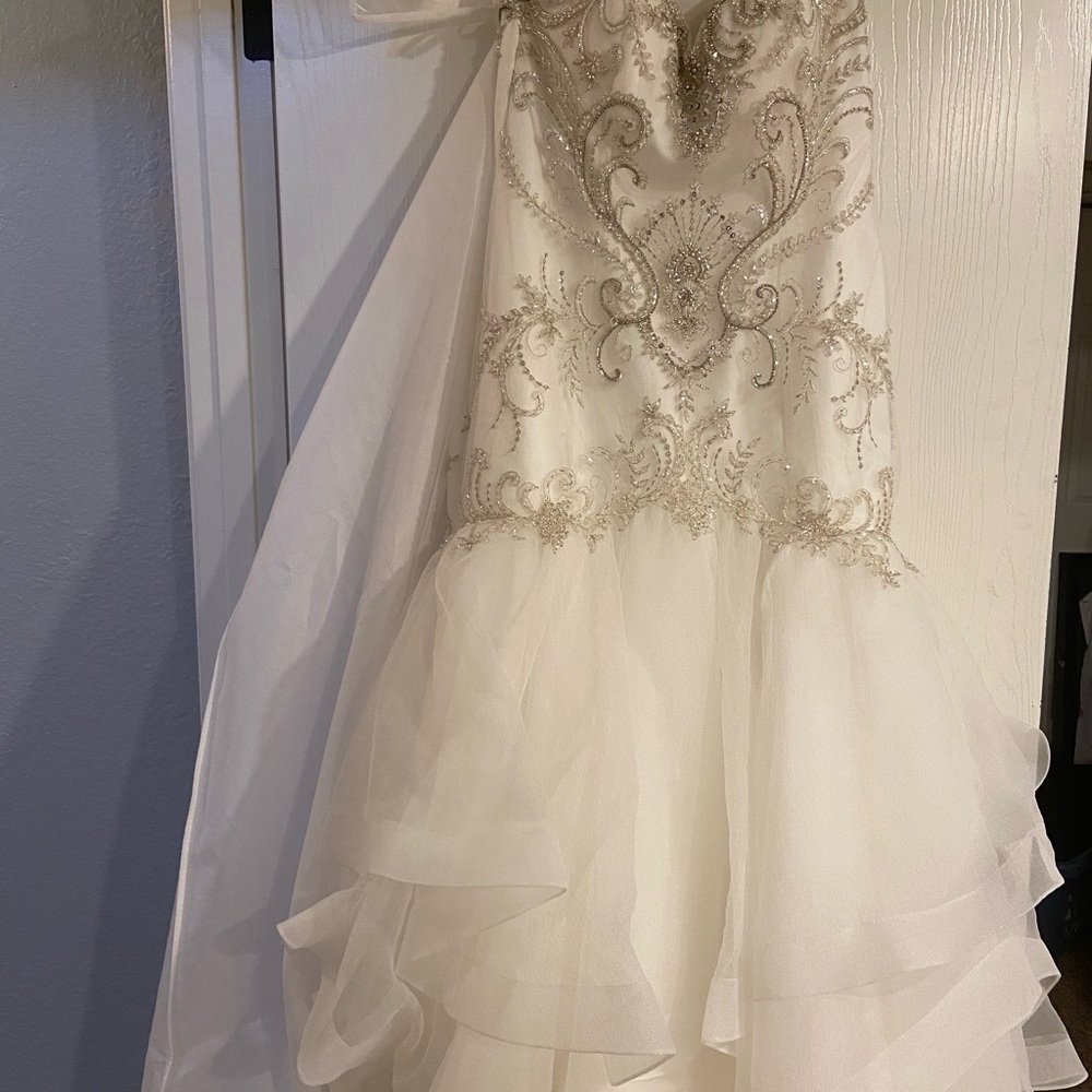 Elegant White Wedding Gown with Silver Embellishment